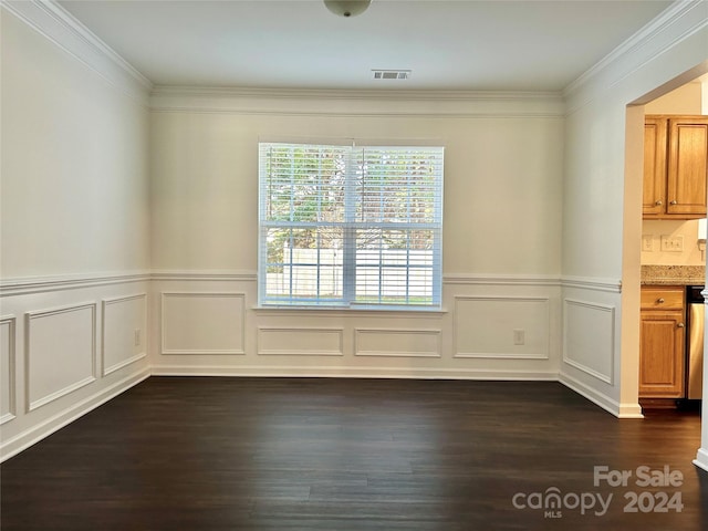 unfurnished dining area with dark hardwood / wood-style flooring and crown molding