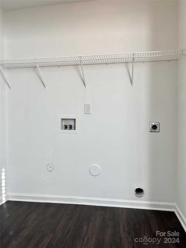 laundry area with hookup for an electric dryer, hookup for a washing machine, gas dryer hookup, and dark wood-type flooring