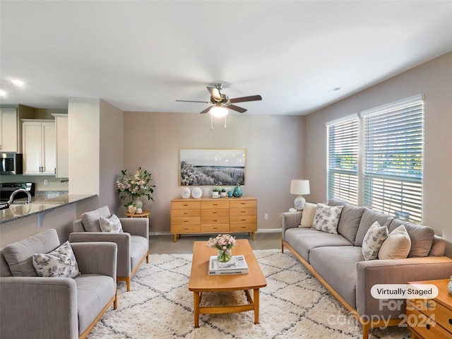 living room featuring ceiling fan