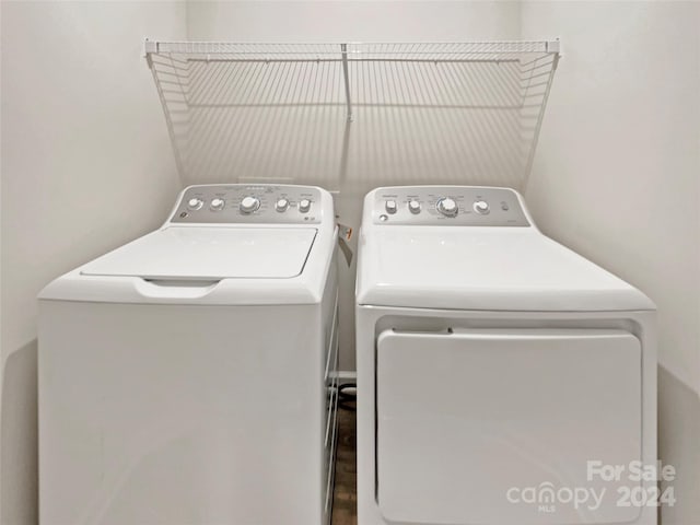 clothes washing area with independent washer and dryer