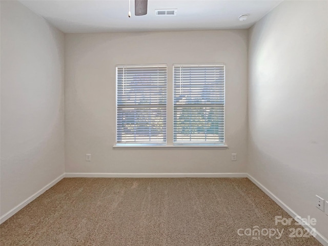 view of carpeted spare room