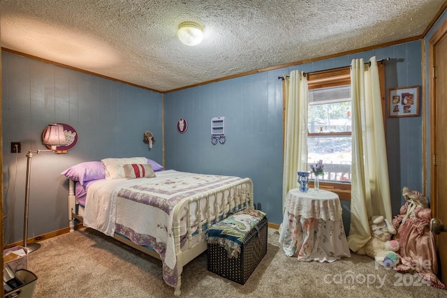 carpeted bedroom with wooden walls, crown molding, and a textured ceiling