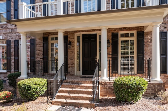 property entrance with covered porch