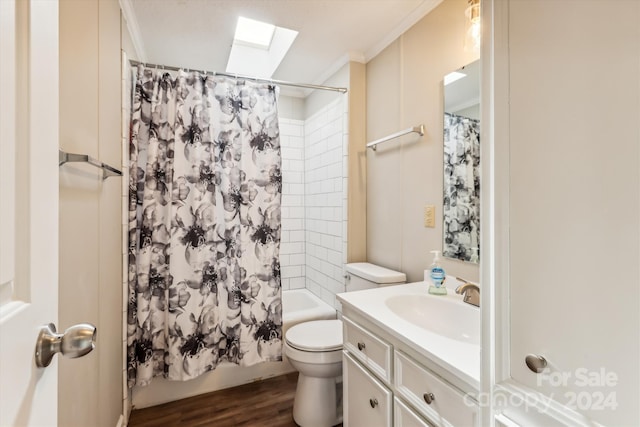 full bathroom featuring shower / bath combination with curtain, toilet, vanity, crown molding, and hardwood / wood-style flooring