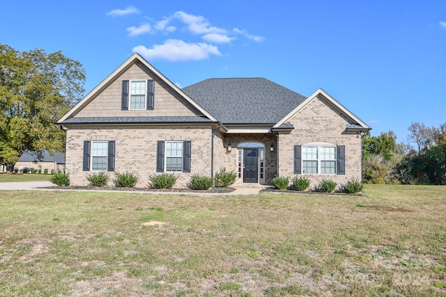 view of front facade with a front lawn