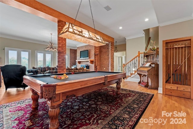 rec room featuring crown molding, french doors, light wood-type flooring, and billiards