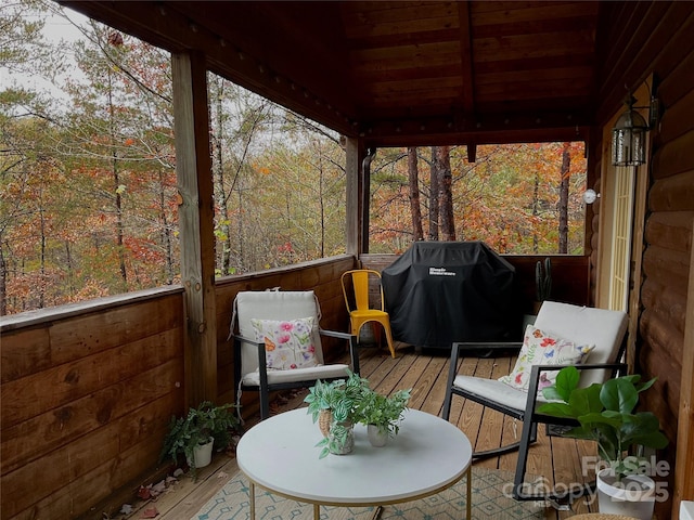 wooden deck featuring grilling area