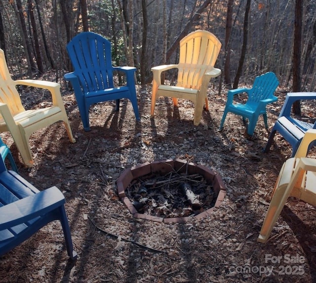 view of patio featuring an outdoor fire pit