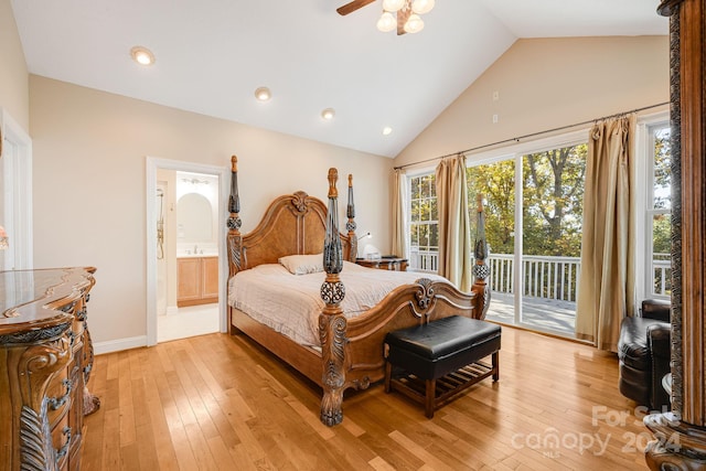 bedroom with access to exterior, light wood-type flooring, ensuite bath, ceiling fan, and high vaulted ceiling