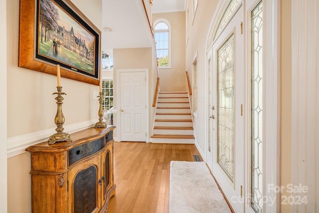 foyer with light wood-type flooring