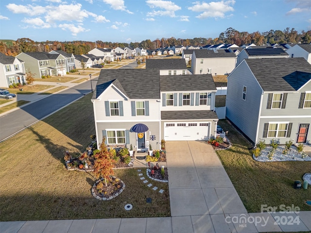 multi unit property featuring a garage