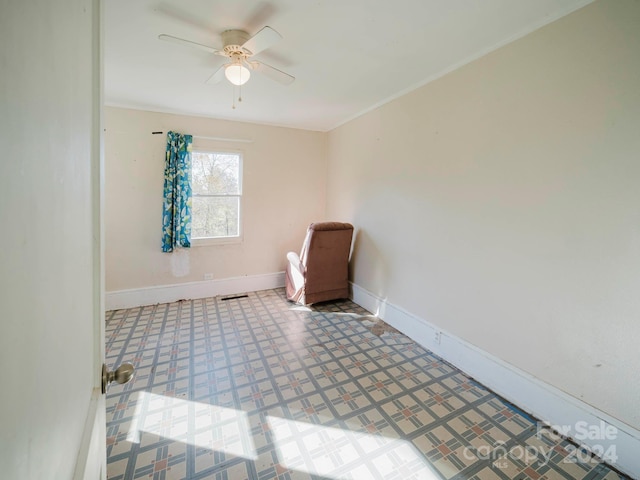 spare room with ceiling fan