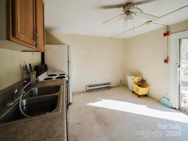 kitchen with ceiling fan, sink, white range with electric cooktop, and a baseboard heating unit