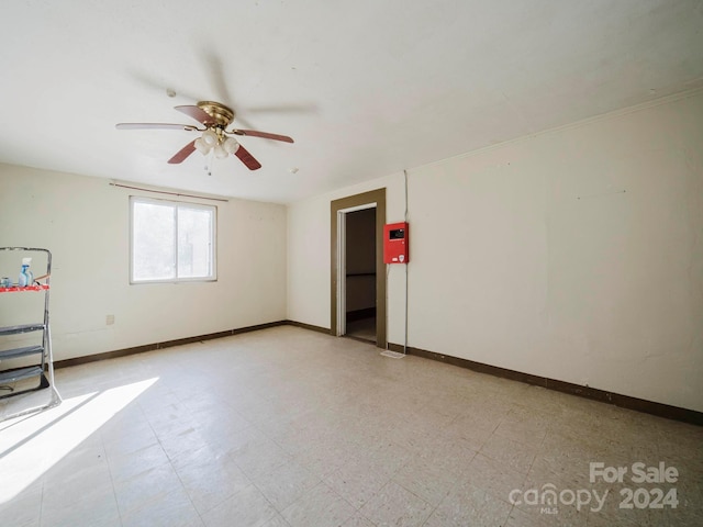 spare room featuring ceiling fan