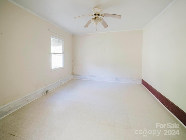 unfurnished room featuring crown molding and ceiling fan