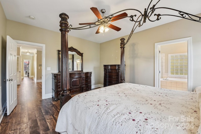 bedroom featuring ensuite bathroom, dark hardwood / wood-style floors, and ceiling fan