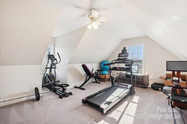 exercise area with ceiling fan, lofted ceiling, and carpet