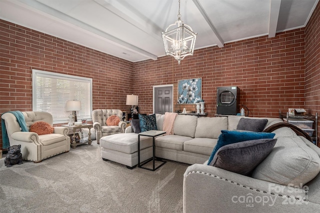 carpeted living room with beamed ceiling, an inviting chandelier, and brick wall