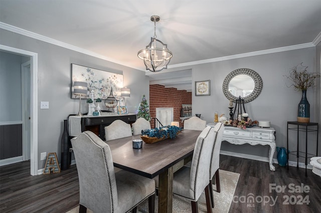 dining room featuring crown molding, an inviting chandelier, and dark hardwood / wood-style flooring