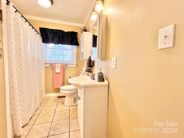 bathroom with crown molding, tile patterned flooring, vanity, and toilet