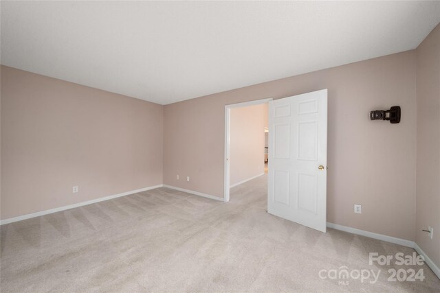 267 Rocky Mountain Way, Arden, NC 28704 - empty room with light carpet and baseboards