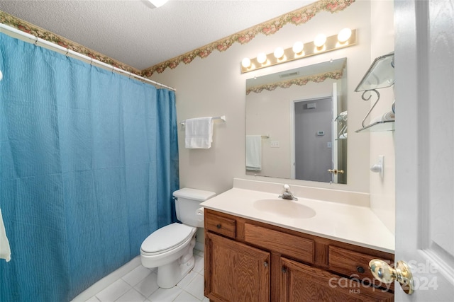 bathroom featuring tile patterned flooring, a shower with curtain, a textured ceiling, vanity, and toilet