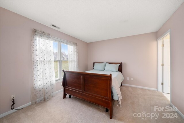 267 Rocky Mountain Way, Arden, NC 28704 - carpeted bedroom featuring baseboards