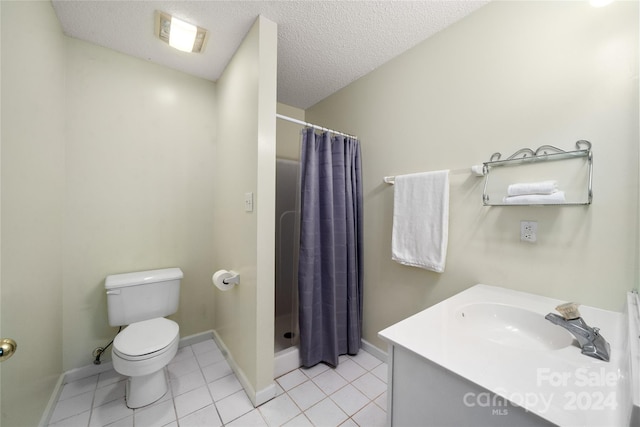 bathroom with tile patterned flooring, a shower with shower curtain, a textured ceiling, and toilet