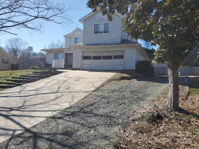 front of property with a garage