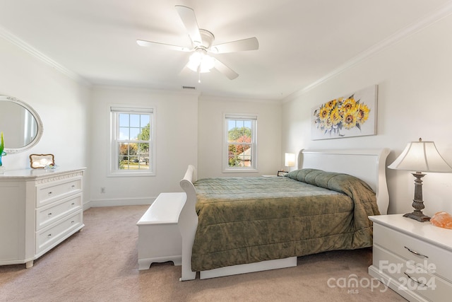 carpeted bedroom featuring ceiling fan, crown molding, and multiple windows