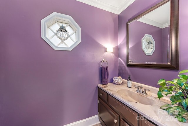 bathroom with vanity and crown molding