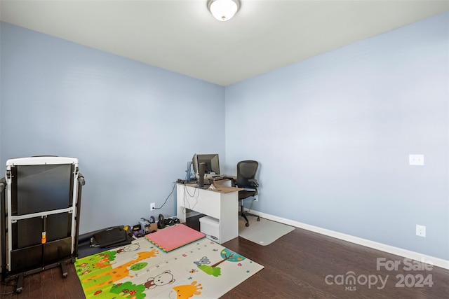 office with dark wood-type flooring