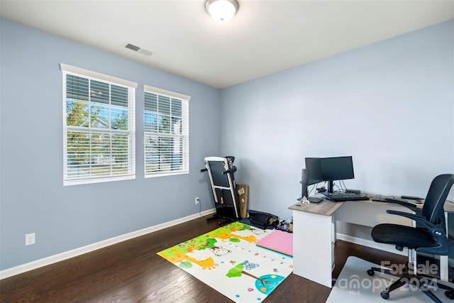 home office featuring dark hardwood / wood-style floors