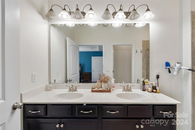 bathroom featuring vanity and walk in shower