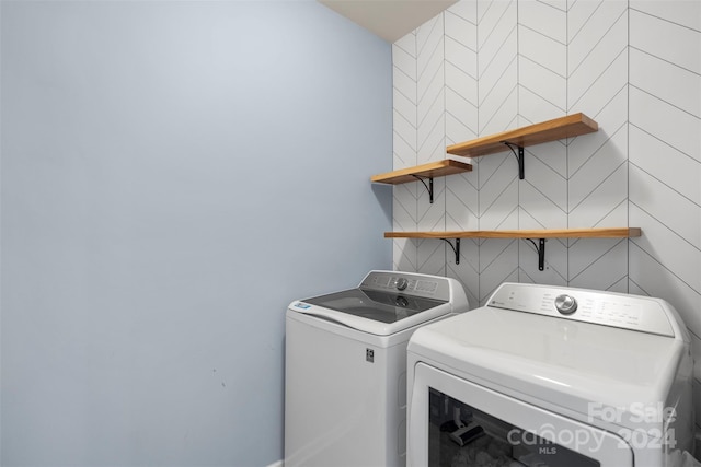 laundry room featuring independent washer and dryer