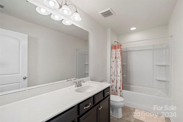 full bathroom with vanity, shower / bath combo with shower curtain, toilet, and tile patterned flooring