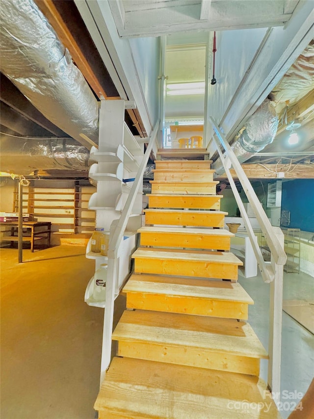 stairs with concrete floors