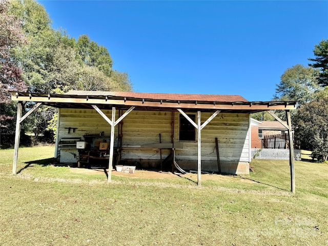 view of outdoor structure featuring a yard