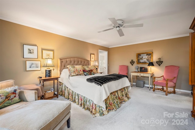 bedroom featuring light carpet, crown molding, and ceiling fan