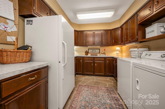 laundry room featuring washer and clothes dryer