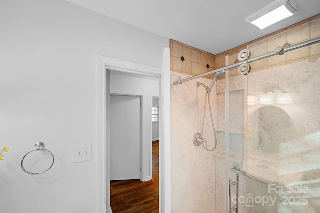 1727 Hartford Dr, Gastonia, NC 28052 - bathroom with a stall shower and wood finished floors