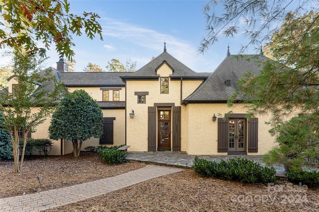 french country home featuring french doors