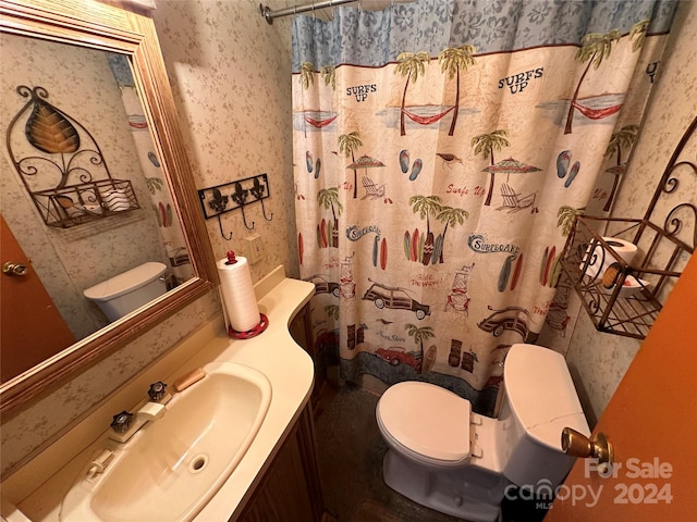 bathroom with vanity and toilet