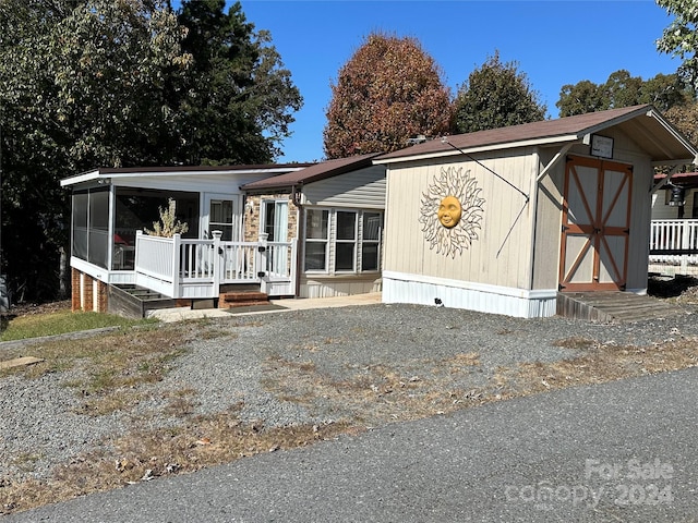 manufactured / mobile home featuring a storage unit