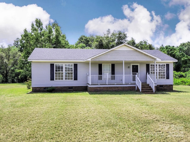 ranch-style house with covered porch and a front lawn