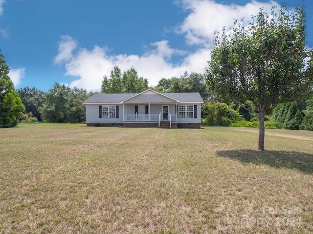 ranch-style house with a front yard