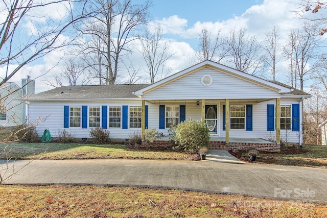 ranch-style house featuring a porch