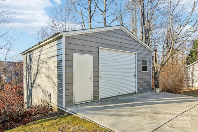 view of outdoor structure with a garage