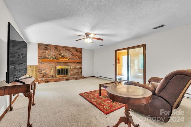 carpeted living room featuring a baseboard heating unit, a textured ceiling, ceiling fan, and a fireplace