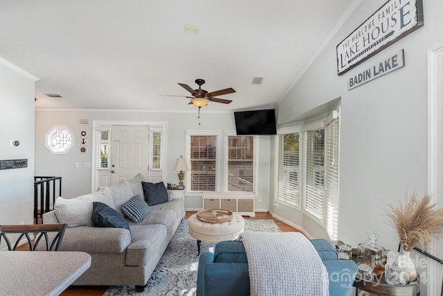 127 Lake View Dr, New London, NC 28127 - living area featuring ornamental molding, ceiling fan, baseboards, and wood finished floors